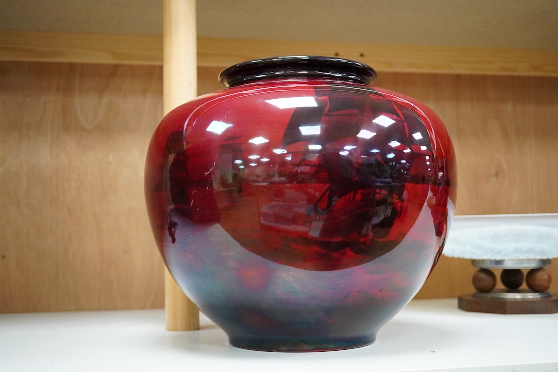 A large Doulton flambe vase decorated with ships, 29cm high